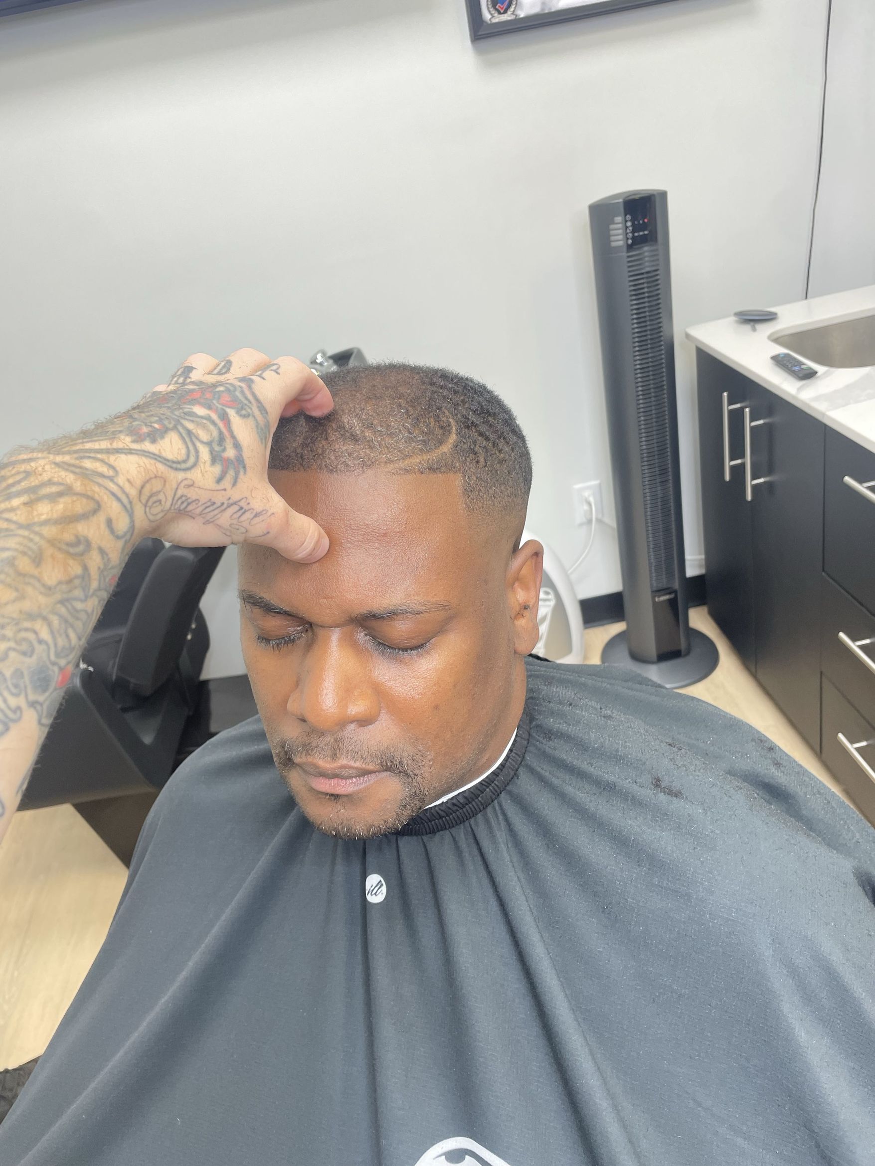 Skin fade with textured top