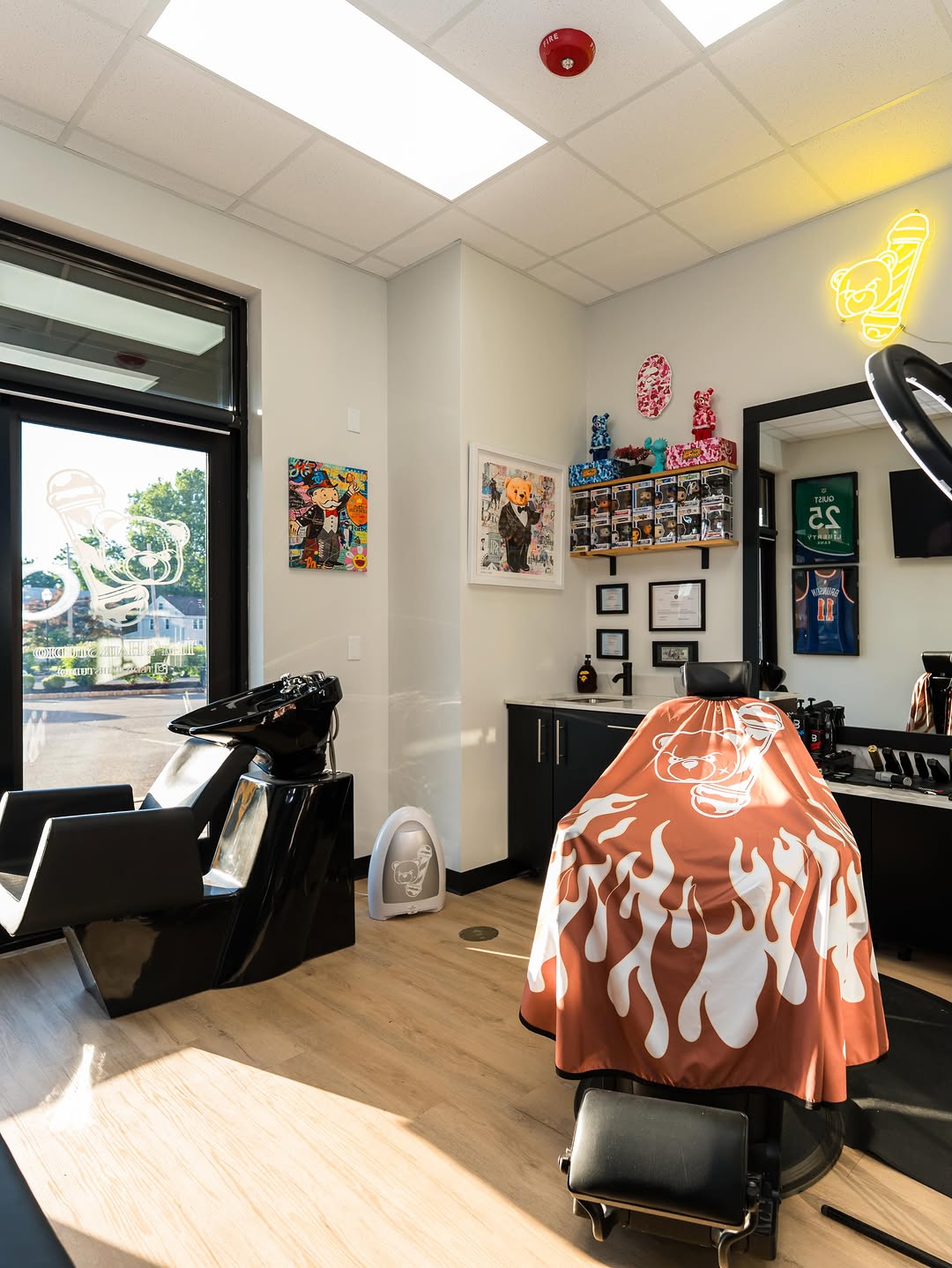 Inside the studio, the cape with the bear mark