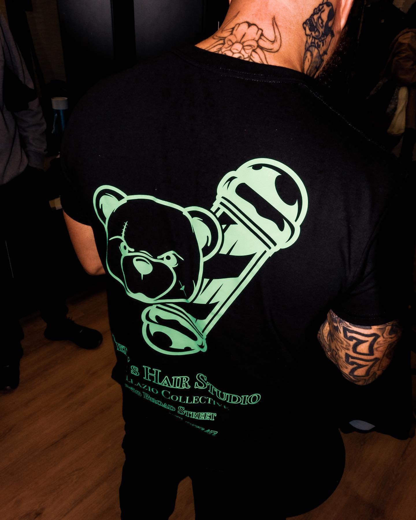 Glow in the Dark Tee, black body with neon glow bear mark